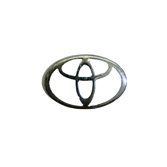 Toyota metal logo sticker in silver, durable and sleek finish – TaMiMi Projects in Qatar.
