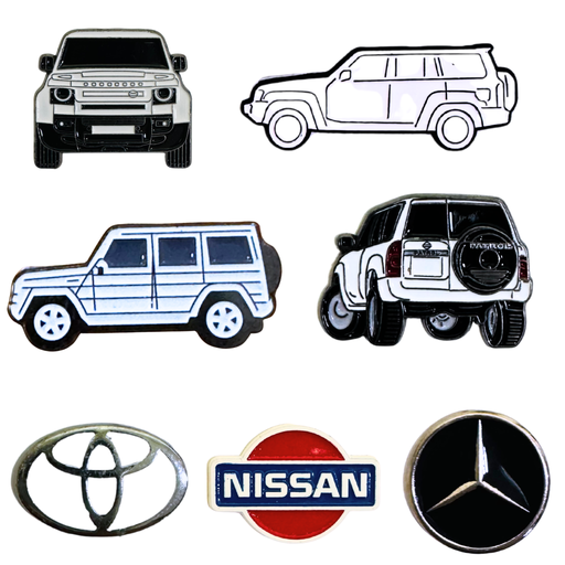 Collection of metal car stickers featuring Nissan, Toyota, Mercedes, Defender, and SUV designs – TaMiMi Projects Qatar.