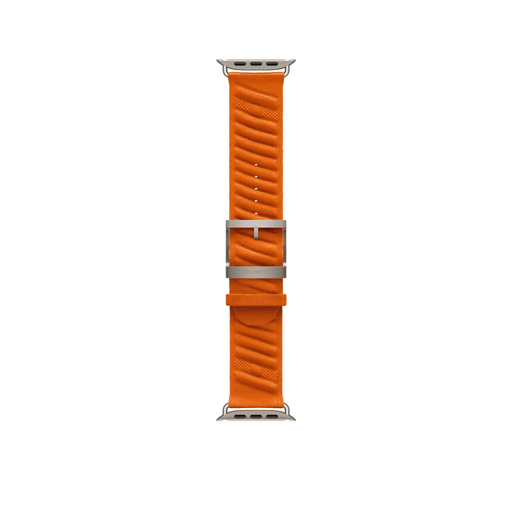 Orange 49mm Hermès En Mer Apple Watch band laid flat, showing the patterned fabric, titanium buckle and adjustment holes.