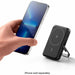 Compact Anker power bank with phone stand