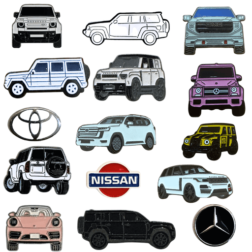 Collection of metal car stickers featuring Nissan, Toyota, Mercedes, Defender, and SUV designs – TaMiMi Projects Qatar.