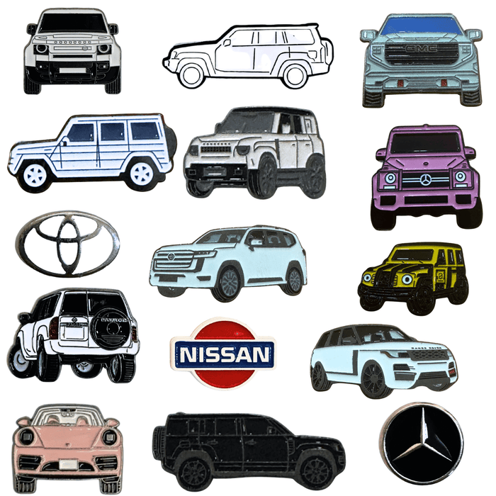 Collection of metal car stickers featuring Nissan, Toyota, Mercedes, Defender, and SUV designs – TaMiMi Projects Qatar.