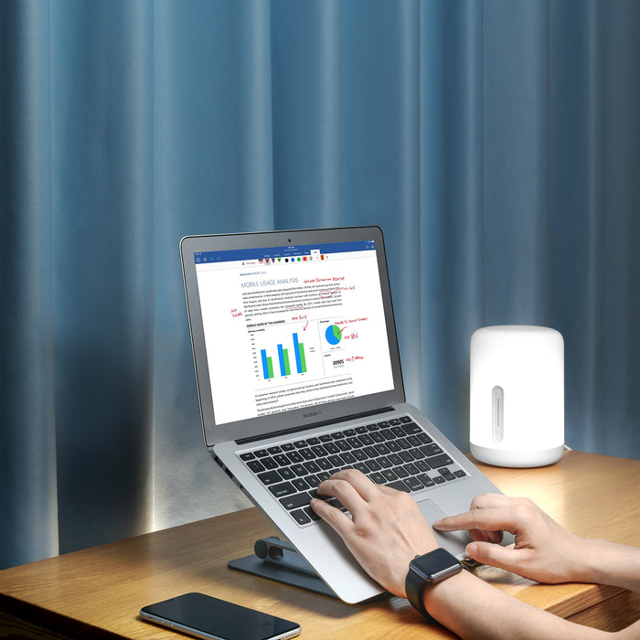 Adjustable aluminum stand for 10-16 inch laptops and iPads, ergonomic, stable, with pads and heat dissipation - TaMiMi Projects in Qatar.