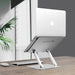 Adjustable aluminum stand for 10-16 inch laptops and iPads, ergonomic, stable, with pads and heat dissipation - TaMiMi Projects in Qatar.