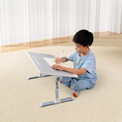 Versatile foldable laptop table for bed or desk, adjustable height, sturdy design, supports up to 20 kg - TaMiMi Projects in Qatar