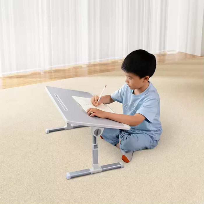 Versatile foldable laptop table for bed or desk, adjustable height, sturdy design, supports up to 20 kg - TaMiMi Projects in Qatar