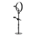 Phone securely mounted on a black ring light stand with an adjustable holder.