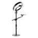Close-up view of an adjustable black ring light stand joint, showing its robust construction.
