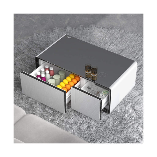 Multi-functional coffee table with USB charging ports, outlets, and smart controls from TaMiMi Projects in Qatar.