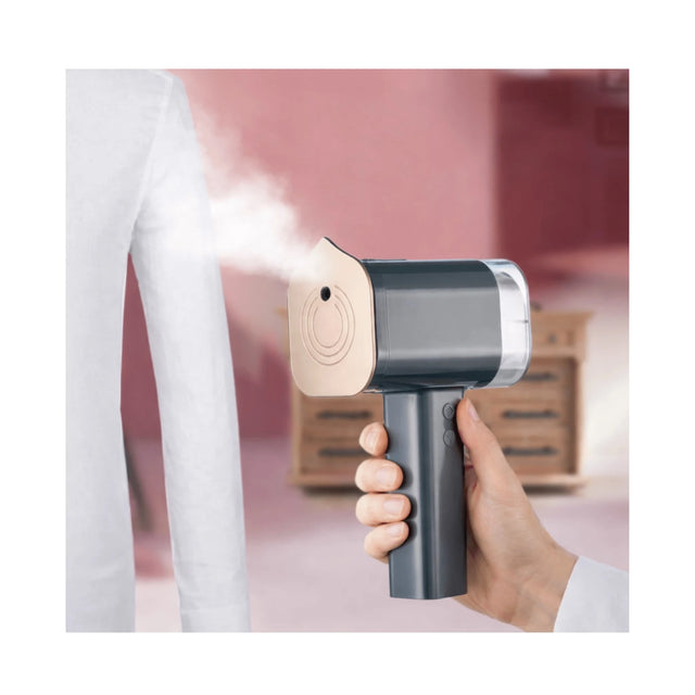 Black cordless portable steam device with lint remover and 5200mAh battery by TaMiMi Projects in Qatar
