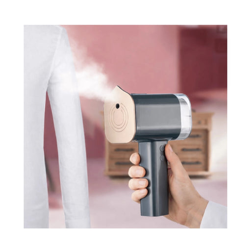 Black cordless portable steam device with lint remover and 5200mAh battery by TaMiMi Projects in Qatar
