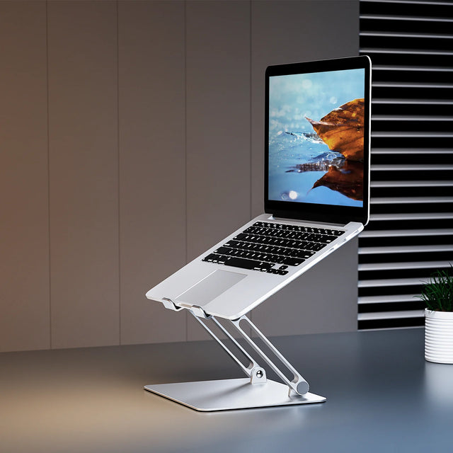 Adjustable aluminum stand for 10-16 inch laptops and iPads, ergonomic, stable - TaMiMi Projects in Qatar.