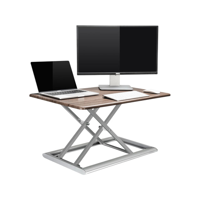 Adjustable aluminum standing desk riser, at TaMiMi Projects, Qatar. ergonomic design, height adjustment, ideal for work & study.