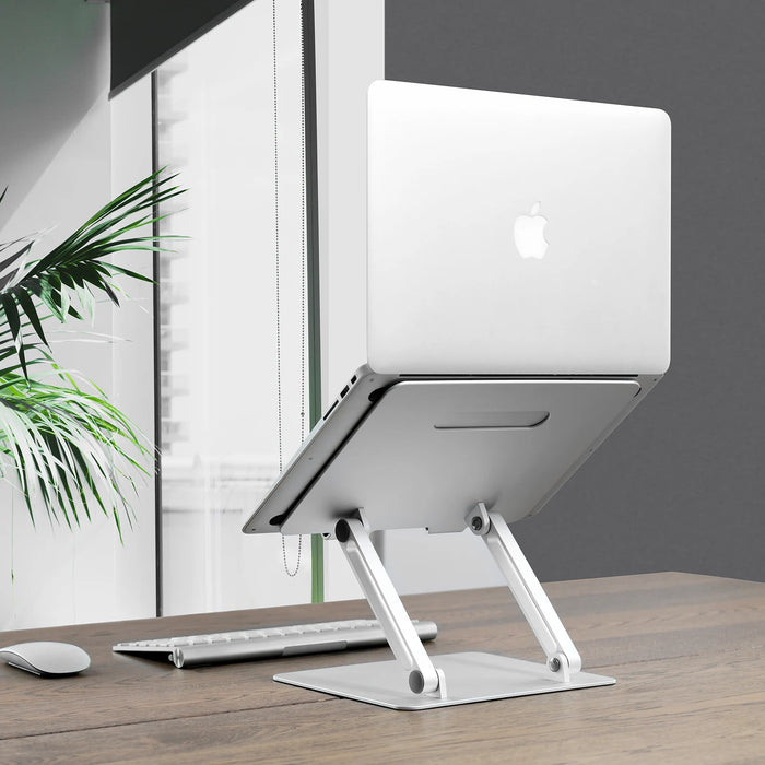 Adjustable aluminum stand for 10-16 inch laptops and iPads, ergonomic, stable - TaMiMi Projects in Qatar.