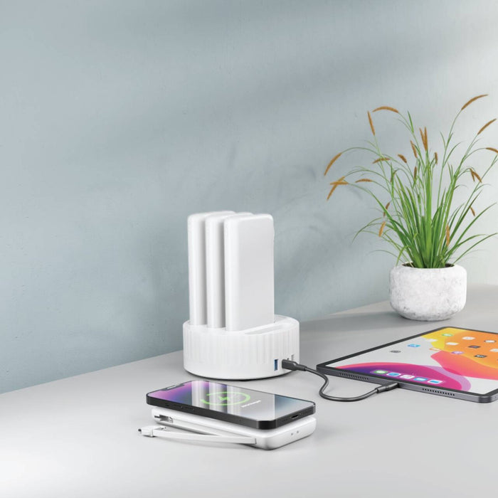 White charging station with 4 MagSafe chargers, 10,000mAh capacity each, and 100W power output. Ideal for efficiently charging multiple devices.