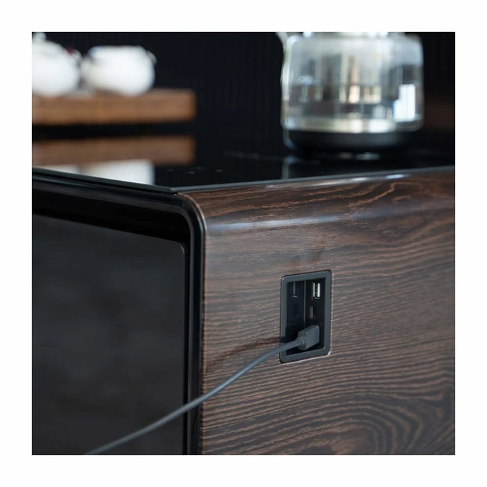 Stylish table with a tempered glass top, adjustable LED colors, fridge storage, and Bluetooth features from TaMiMi Projects in Qatar
