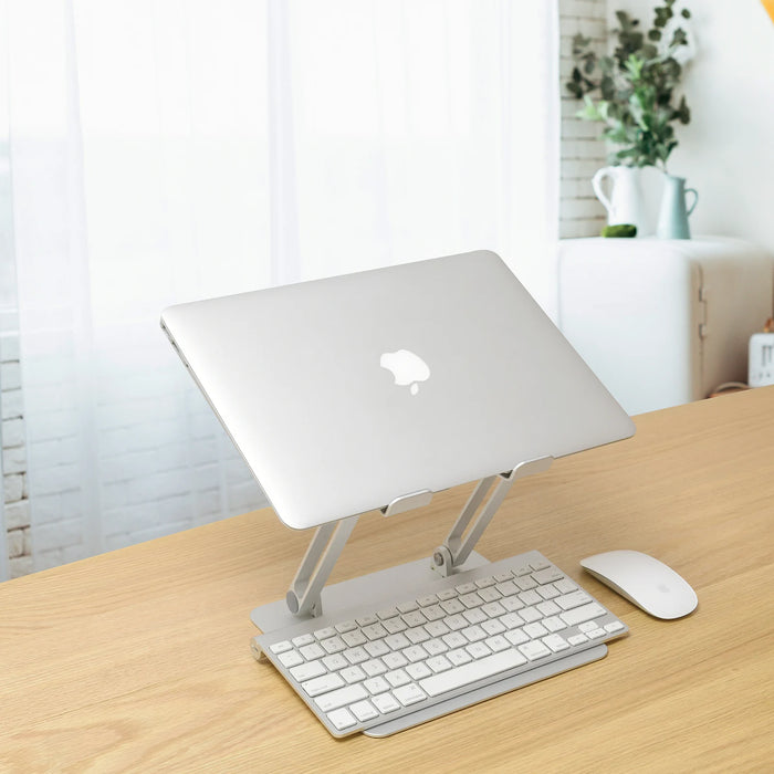 Adjustable aluminum stand for 10-16 inch laptops and iPads, ergonomic, stable - TaMiMi Projects in Qatar.