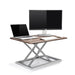 Adjustable aluminum standing desk riser from TaMiMi Projects in Qatar. ergonomic design, easy height adjustment, ideal for work and study