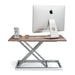 Adjustable aluminum standing desk riser from TaMiMi Projects in Qatar. ergonomic design, easy height adjustment, ideal for work and study