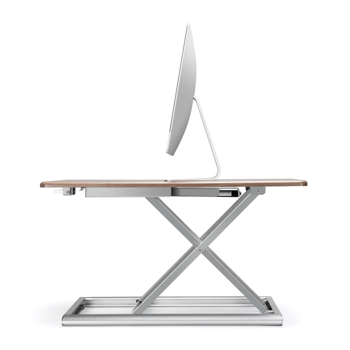 Adjustable aluminum standing desk riser from TaMiMi Projects in Qatar. ergonomic design, easy height adjustment, ideal for work and study