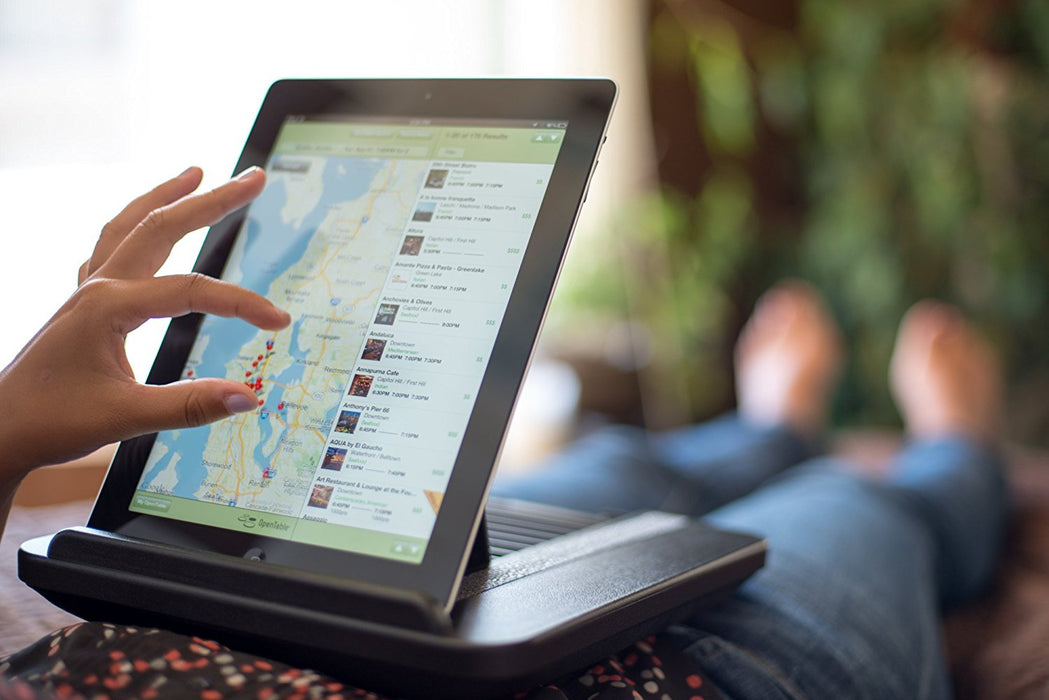 Portable iPad stand by Padded Spaces, adjustable 14 degrees, lightweight, perfect for travel, from TaMiMi Projects in Qatar.