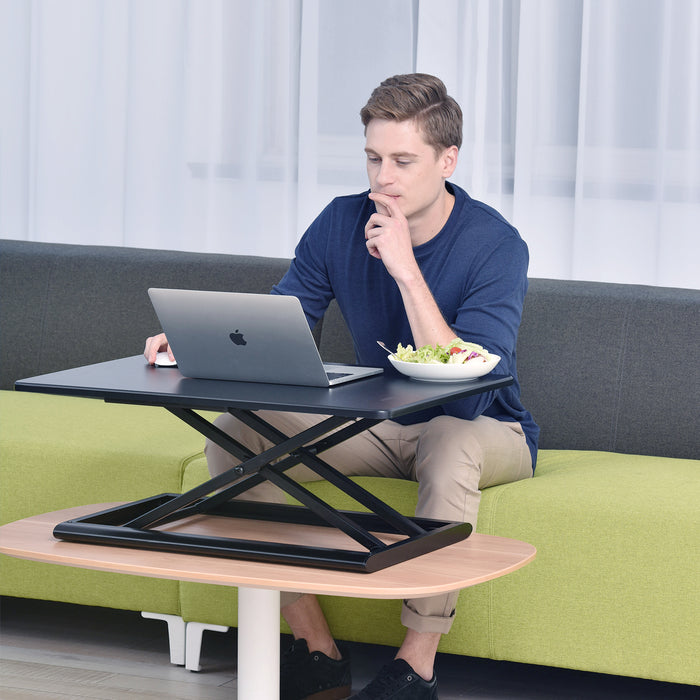 Adjustable aluminum standing desk riser from TaMiMi Projects in Qatar. ergonomic design, easy height adjustment, ideal for work and study