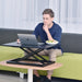 Adjustable aluminum standing desk riser from TaMiMi Projects in Qatar. ergonomic design, easy height adjustment, ideal for work and study
